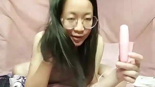 Hot petite Asian brunette latitudinarian in  her room